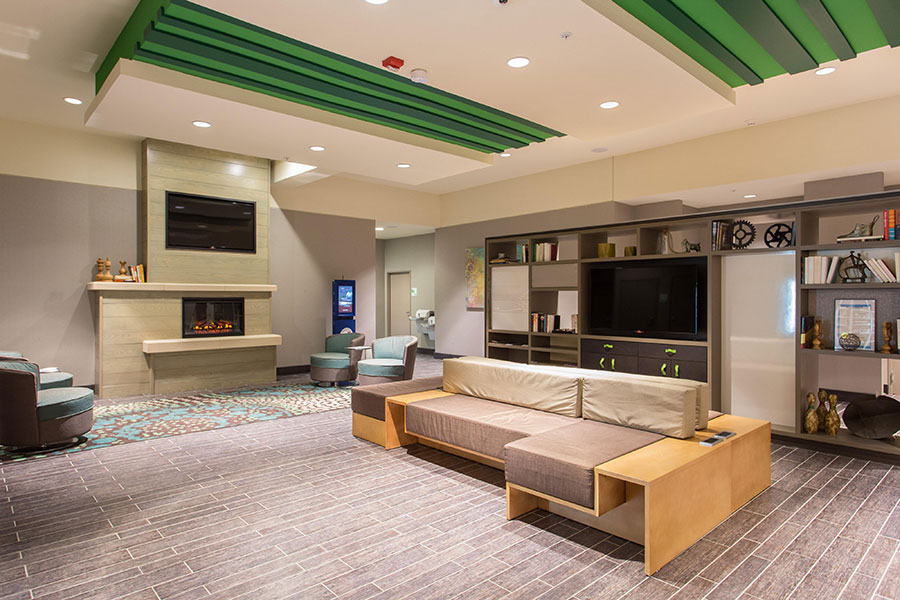 lobby area seating with sofas and fireplace